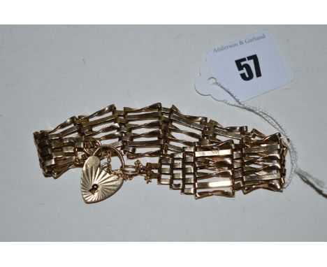 A 9ct yellow gold gate-link pattern bracelet, 12.9gms.