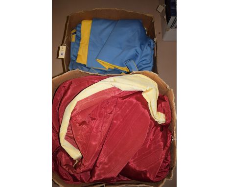 A pair of pale blue lined curtains with tab tops; together with two other pairs of curtains in royal blue and claret.
