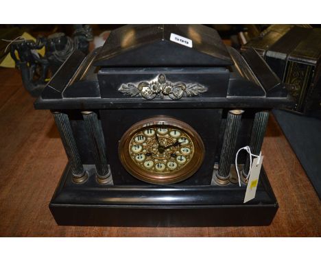 A black slate cased architectural design clock.