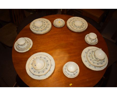 A Royal Worcester 'Blue Medallion' pattern part tea and dinner service, comprising: dinner plates, soup bowls, tea cups and s