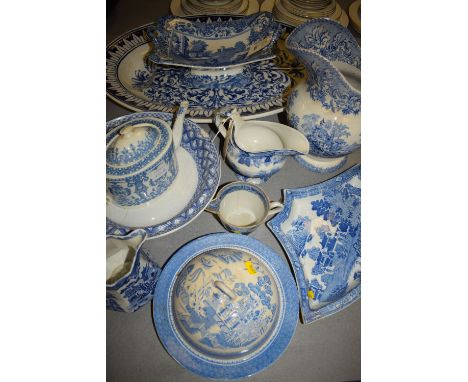 A collection of miscellaneous blue and white ceramics comprising; Spode fruit bowl with two loop handles; a large meatplate; 