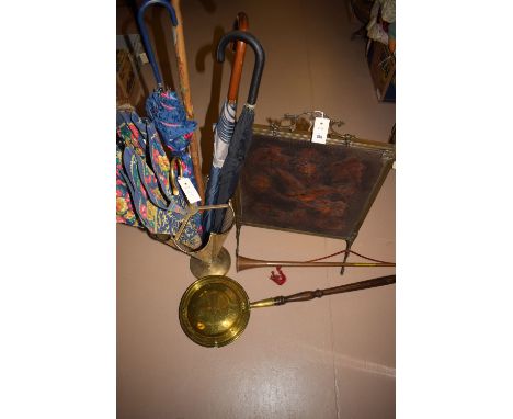 A modern brass umbrella receiver, in the shape of an umbrella; a brass warming pan; a copper hunting horn; and a brass and co