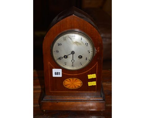 An Edwardian inlaid mahogany mantel clock.