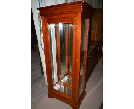 A French cherry stained wood mirror back display cabinet with glazed panel door with sides, 162cms high.