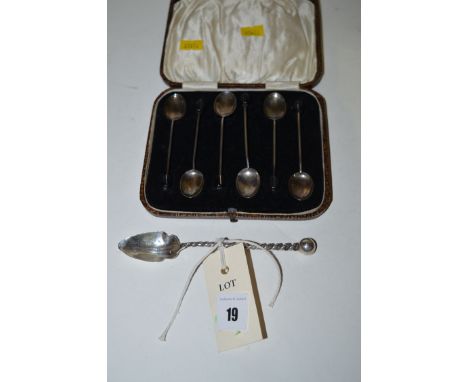 A set of six silver bean finial coffee spoons, by M & J, Birmingham 1924, cased; together with an American silver teaspoon, b