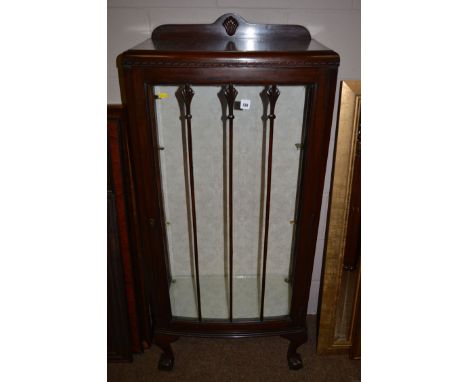 An early 20th Century mahogany bowfront display cabinet, with glazed door and side panels, 57cm wide.