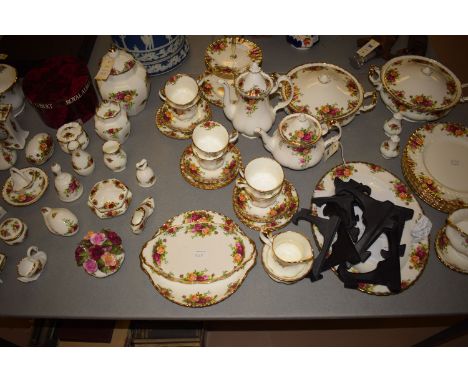 A large quantity of Royal Albert 'Old Country Roses' pattern ware, to include part dinner and tea service, ornaments, a ginge