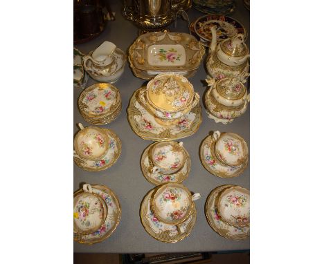 A Victorian part afternoon tea and part dessert service, decorated had-painted sprays of flowers, white ground with beige and