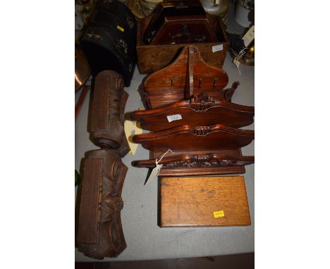 Wooden collectables to include: a letter tray; a wall bracket with leather trim; 19th Century pine spice box; a pair of corbe