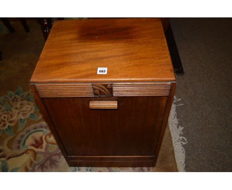 A 1930's mahogany coal cabinet, the hinged front with later fitted interior.