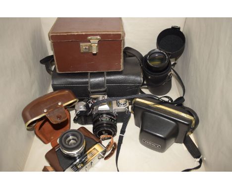 Canon AV-1 SLR camera; a Yashica SLR camera; Zeiss Icon camera and sundries.