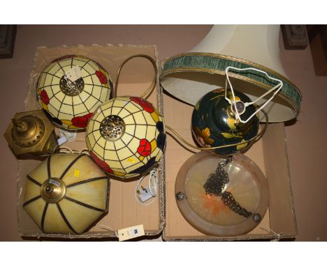 Three reproduction Tiffany style table lamps; an Art Deco style ceiling light; a Chinese style ginger jar, decorated with gre