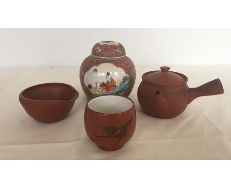 4 oriental ceramics. Comprising:- Famille Rose lidded jar, small terracotta teapot, and 2 bowls Jar 11cm tall.