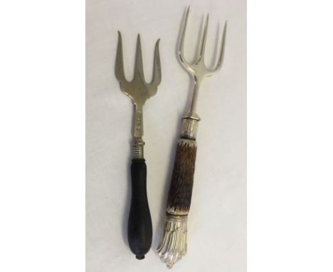 A Victorian silver bread fork with horn handle. Sheffield 1896 together with an EPNS bread fork.  