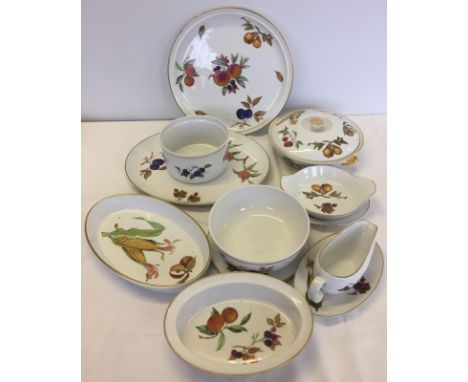 A collection of Royal Worcester " Evesham" dinnerware comprising of 11 pieces. To include a lidded tureen, sauceboat, 2 large
