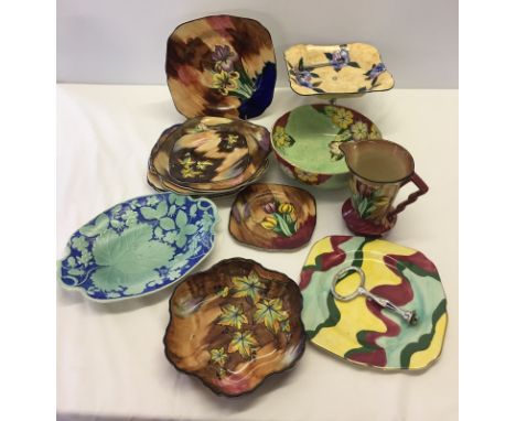 A large collection of H&K hand painted ceramics. 14 pieces including Tulip, Luscious, Iris, and Autumn Tints patterns. 