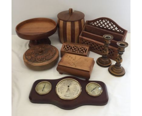 A box of wooden items. To include letter rack and barometer. 