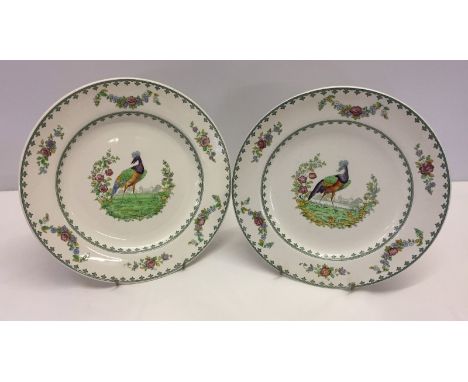 2 Copeland Spode hand painted dinner plates. With central bird decoration. 