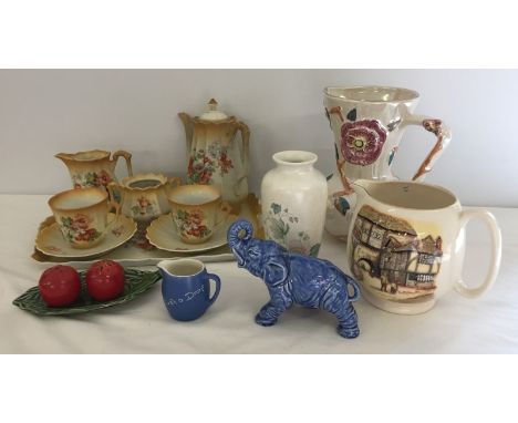 A small collection of ceramics to include Arthur Wood , Poole and Sylvac cruet set.  