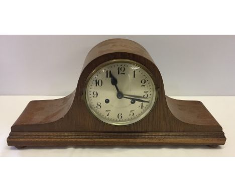 A vintage wooden mantle clock. In working order. 