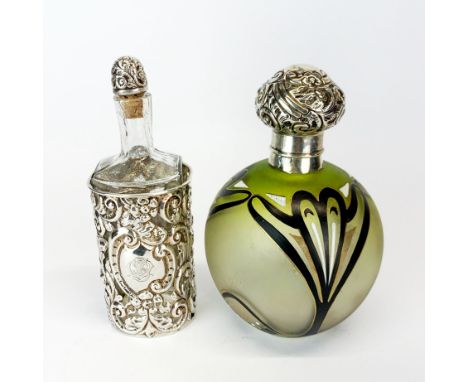 A hallmarked silver cased cologne bottle (Chester c.1908) H. 14cm together with a white metal topped hand painted perfume bot