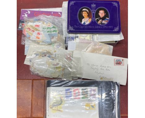 A quantity of mixed first day covers and other stamps.