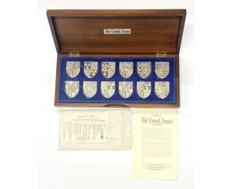 A cased set of The Royal Arms silver ingots.