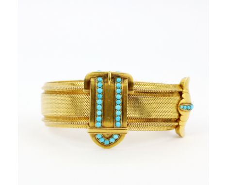 A heavy high carat gold (tested approx. 22ct gold) and turquoise buckle bangle/bracelet, widest inner W. 7cm. Total gross wei