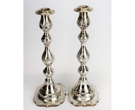 A pair of hallmarked silver candlesticks, H. 8cm. Not weighted.