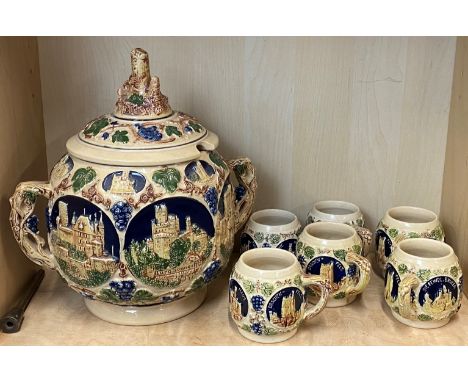 A vintage German glazed pottery gluhwein set, H. 32cm.