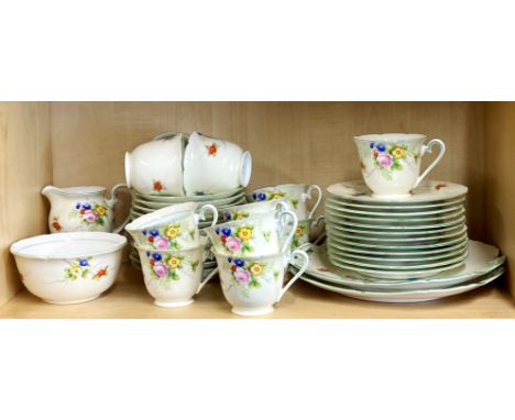 An extensive 1930's hand painted Noritake porcelain tea set, twelve settings.