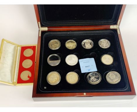 A case of mixed silver and other coins.