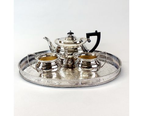 A Garrard and Co silver plated tea set and gallery tray.