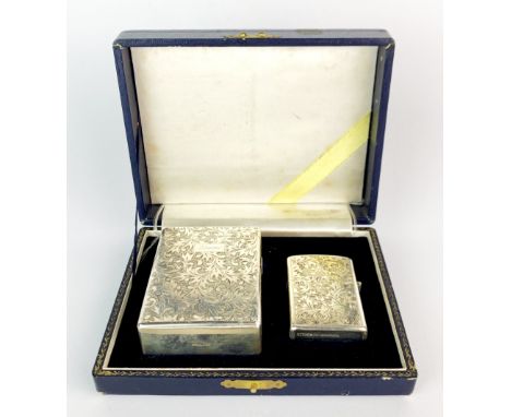 A cased 950 silver Nisshin engraved cigarette case and matching lighter, cigarette case 7.5 x 5.5 x 2.5cm.