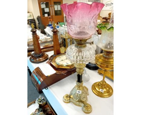 19TH CENTURY BRASS OIL LAMP WITH CUT GLASS BOWL CRANBERRY SHADE - CRACK TO FONT SEE ADDITIONAL PHOTO