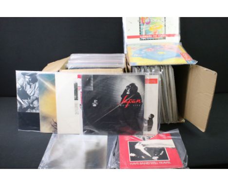 Vinyl - Approximately 200 Rock and Pop 12” singles in 2 boxes to include: Japan, Lou Reed, Joy Division, The Beat, U2, Prince