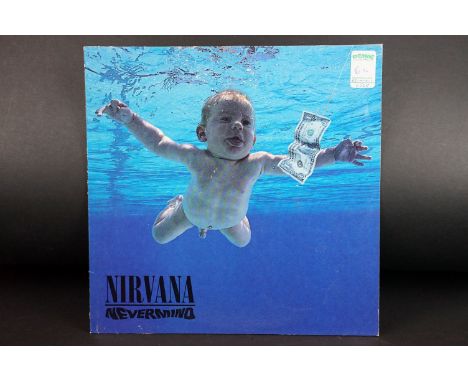 Vinyl - Nirvana Nevermind LP on Geffen.  A1/B2 matrices, Made In Germany text to label.  Sleeve at least Vg, Vinyl has many l