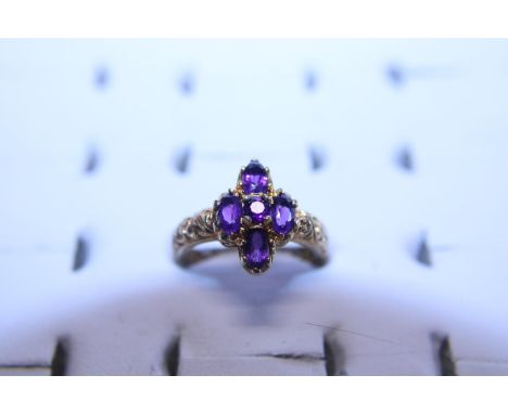 A 9ct Gold and five stone Amethyst ring 3.85g 