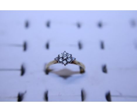 An 18CT gold and diamond cluster ring 2.84 Grams 