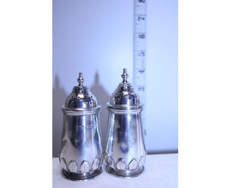 A pair of hallmarked Silver pepper pots 155g 