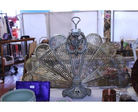 A large brass Peacock fan style fire screen,  shipping unavailable 