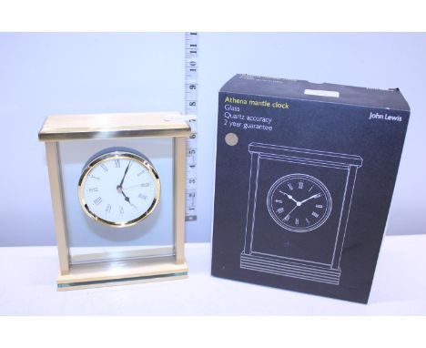 A new boxed Athena mantle clock 