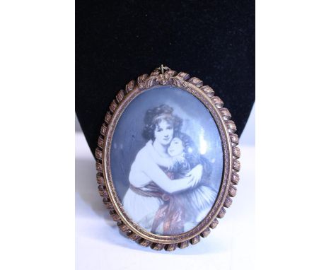 A antique framed and hand painted portrait on bone 
