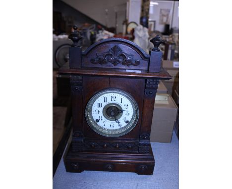 A Fattorini and Sons wooden mantle clock with pendulum and key a/f 