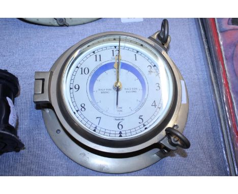 A brass Nauticali ships clock converted for battery use. 