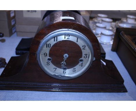 A antique Napoleons hat mantle clock with key and pendulum, a/f 