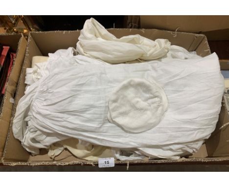 A box of vintage infant's clothes
