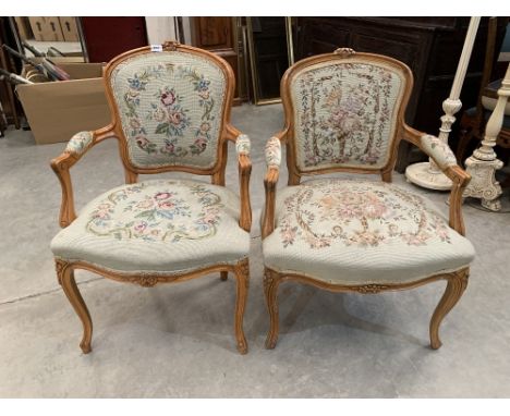 A pair of fauteuil elbow chairs upholstered in Aubusson style tapestry
