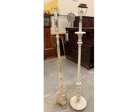 Two white painted lamp standards