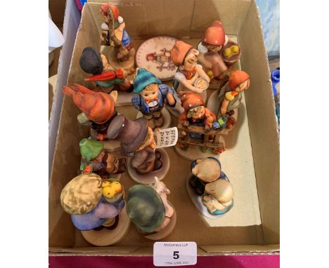 A collection of Goebel Hummel figures